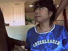 Asian Slut Sucks Two Black Cocks