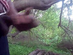 guy blasts thick cumshot deep in forest trees outdoors