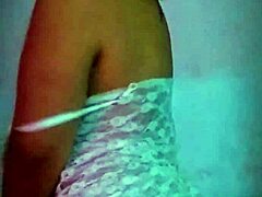 Latina amateur plays with dildo showing big natural tits.