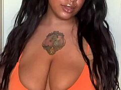 Ebon milf slut shakes big tits and ass in horny bikini dance tease