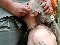 french milf slave bound in forest for bdsm anal cum mouth humiliation