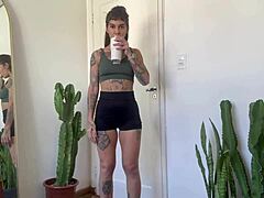 ever tried rubber band yoga with an inked fitness babe?