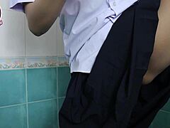Thai schoolgirl ninewthai masturbates horny pussy in school bathroom 💦😈