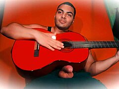 Sexy bodybuilder strokes 18cm monster cock guitar rub to explosive finish