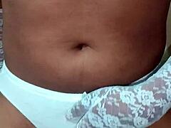 Thai ladyboy shemale poses erotic in white bra and panty