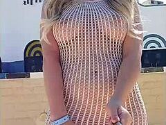 blonde slut flashes big tits thru see-thru dress outdoors no panties