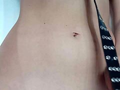 She endures light belt punishment spanking her pussy and tits