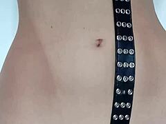 She endures light belt punishment spanking her pussy and tits