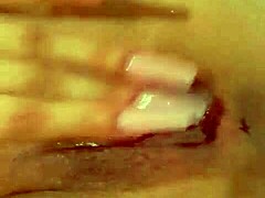 Petite teen babe gently explores her pretty pink pussy solo