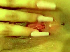 Petite teen babe gently explores her pretty pink pussy solo