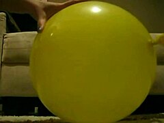 Sophie masturbates wildly with balloons in living room bathroom