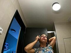 tattooed alia strips panties in bathroom flashing shaved tight pussy and ass