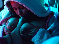 a busty latina lesbian babe caresses her girlfriend's bare feet toes and soles in intimate play moaning softly together