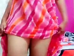 Wanna see this Indian aunty dance and flash her boobs?