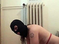 slave in dress trained with belt and piss humiliation