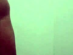 guy masturbates with toys in shower close-up tattooed body