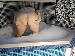 cute pornstar rides cock to anal creampie in steamy bath