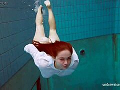 Lola's Big Natural Tits Swim Underwater