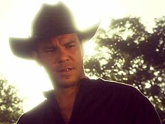 vintage couple rides rough outdoors on boat heels and stockings