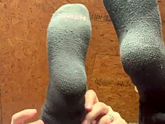 Girl smoothly applies lotion over her soft tempting feet