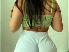 Juicy latina booty shakes wildly in shorts leggings