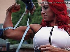 tia marie flexes muscles measures huge biceps sexy redhead