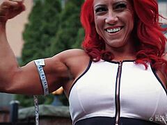 tia marie flexes muscles measures huge biceps sexy redhead