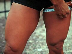 tia marie flexes muscles measures huge biceps sexy redhead