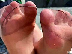 goddess teases cute nylon soles and toes riverside in tan pantyhose closeup