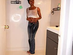 Ebony Model Soaks Jeans Peeing Messily in Shower