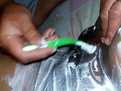 smoothing her plump pussy webcam style before the main event