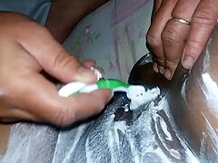 smoothing her plump pussy webcam style before the main event