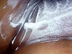 smoothing her plump pussy webcam style before the main event