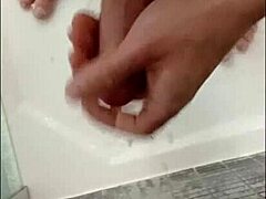 Muscular Blonde Bodybuilder Lathers His Thick Cock in Steamy Shower