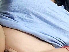 Mature MILF spreads fat hairy pussy wide open while pissing solo