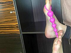 Closeup Footjob In Black Stockings With Anal Toy Play On Bed