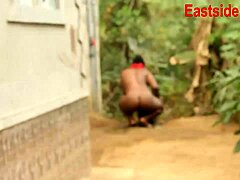 African husband sneaks on busty neighbor bathing outdoors