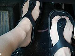Birkenstock-clad mature feet pumped in nylon closeup