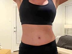 Hey fans, check out this muscle babe flexing her big tits!