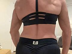 Hey fans, check out this muscle babe flexing her big tits!