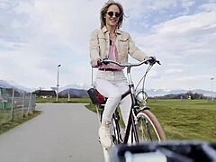 Blonde biker babe Daisy Diamond tempts with outdoor tit tease