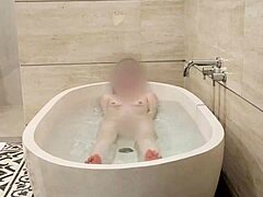 Skinny Japanese college student bathes showing cute small tits and feet