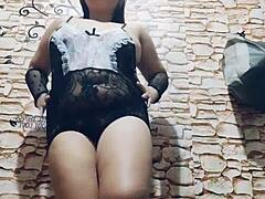 chubby asian rubs dildo on pussy feet lingerie