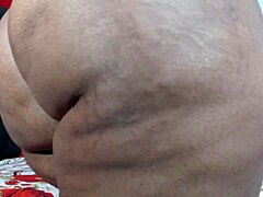 Fat ebony spreads creamy pussy solo in bedroom