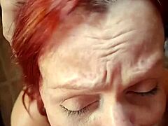naughty redhead squirts cum everywhere on her face!