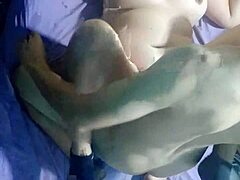 he uncovers her natural tits for intimate missionary thrusting deep in bed