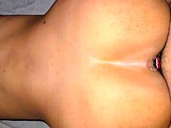 a couple bends her over for doggystyle anal with buttplug until orgasm in her ass