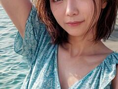 Mature Woman Strolls On The Beach