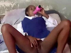black student plays with wet pussy and sucks pink vibrator