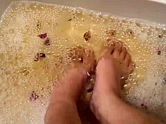 Washing my feet with rose petals and herbs after a hard day of work